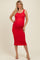 woman wearing a red maternity tank dress that fits snugly over her baby bump