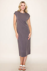 woman wearing a charcoal gray cap sleeve midi dress with a relaxed fit and standing in a neutral background