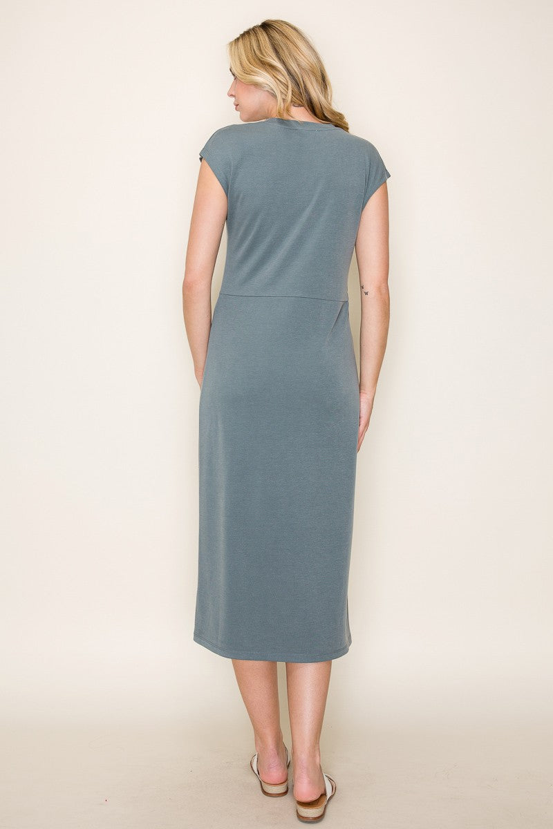woman wearing a gray cap sleeve midi dress, view from the back