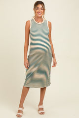 woman wearing a striped maternity midi dress with a fitted silhouette and a round neckline, showcasing her baby bump