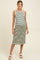 woman wearing a striped maternity midi dress with a fitted silhouette and a round neckline, showcasing her baby bump