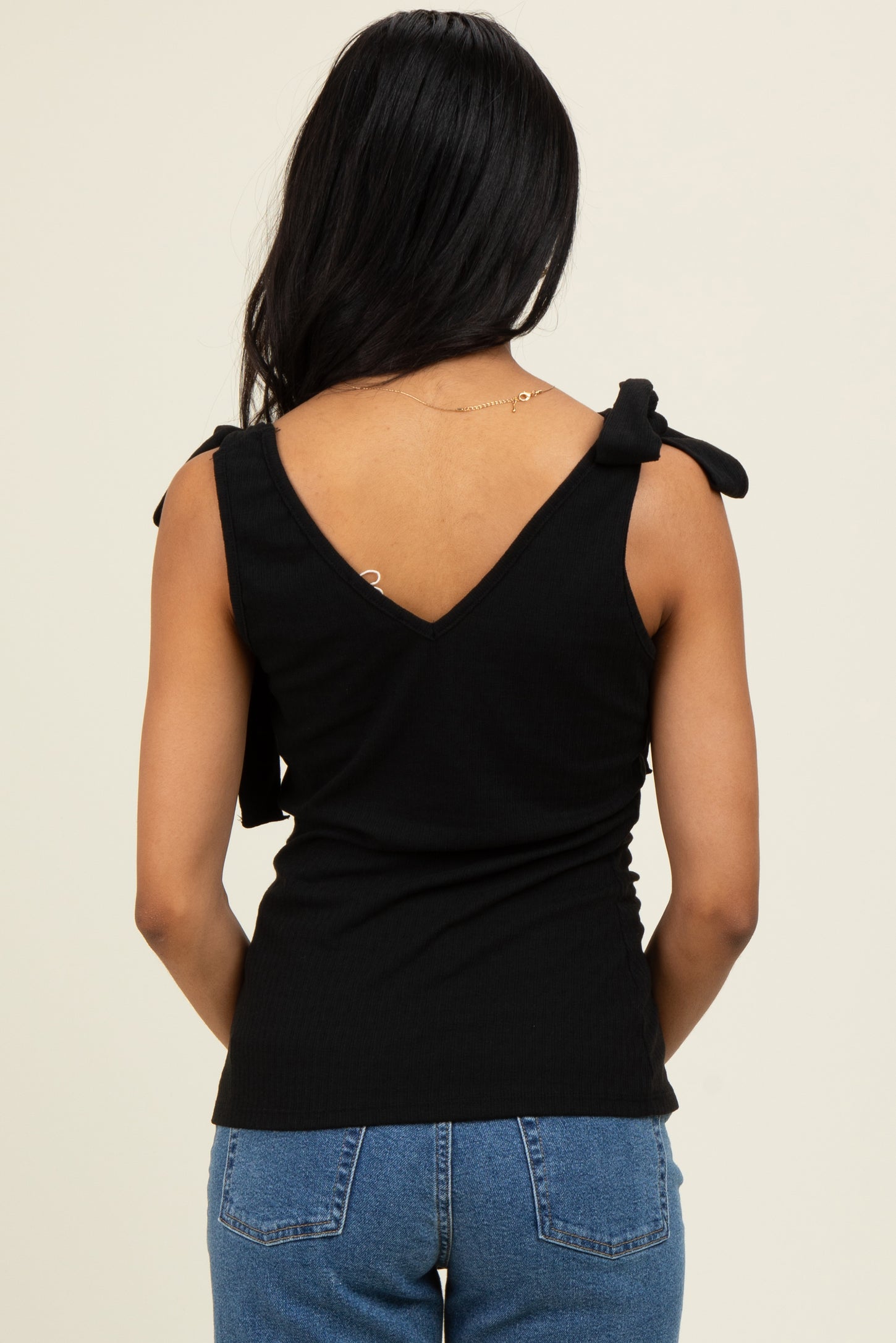 Black Solid Ribbed Sleeveless Tie V-Neck Top