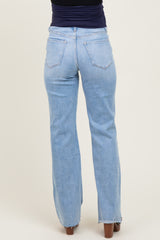 maternity wear light blue bootcut jeans displayed from the back