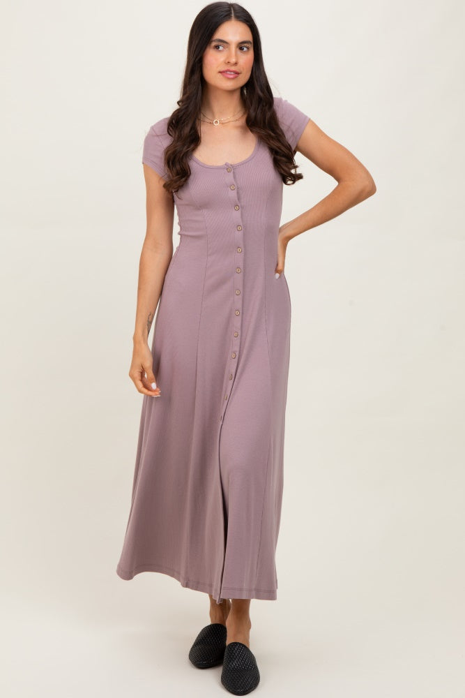 woman wearing a lilac button-front maxi dress with short sleeves and a relaxed fit