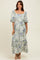 woman wearing a floral maxi dress with puff sleeves and a square neckline