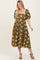 woman wearing an olive green floral midi dress with puff sleeves and a square neckline