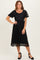 woman wearing a black lace detail midi dress with short sleeves and a square neckline