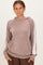 woman wearing a brown ribbed hoodie with a front pocket and white side stripes