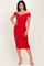 woman wearing a red off-the-shoulder midi dress with a fitted silhouette and side ruching, standing against a neutral background