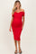 woman wearing a red off-the-shoulder maternity dress that hugs her baby bump