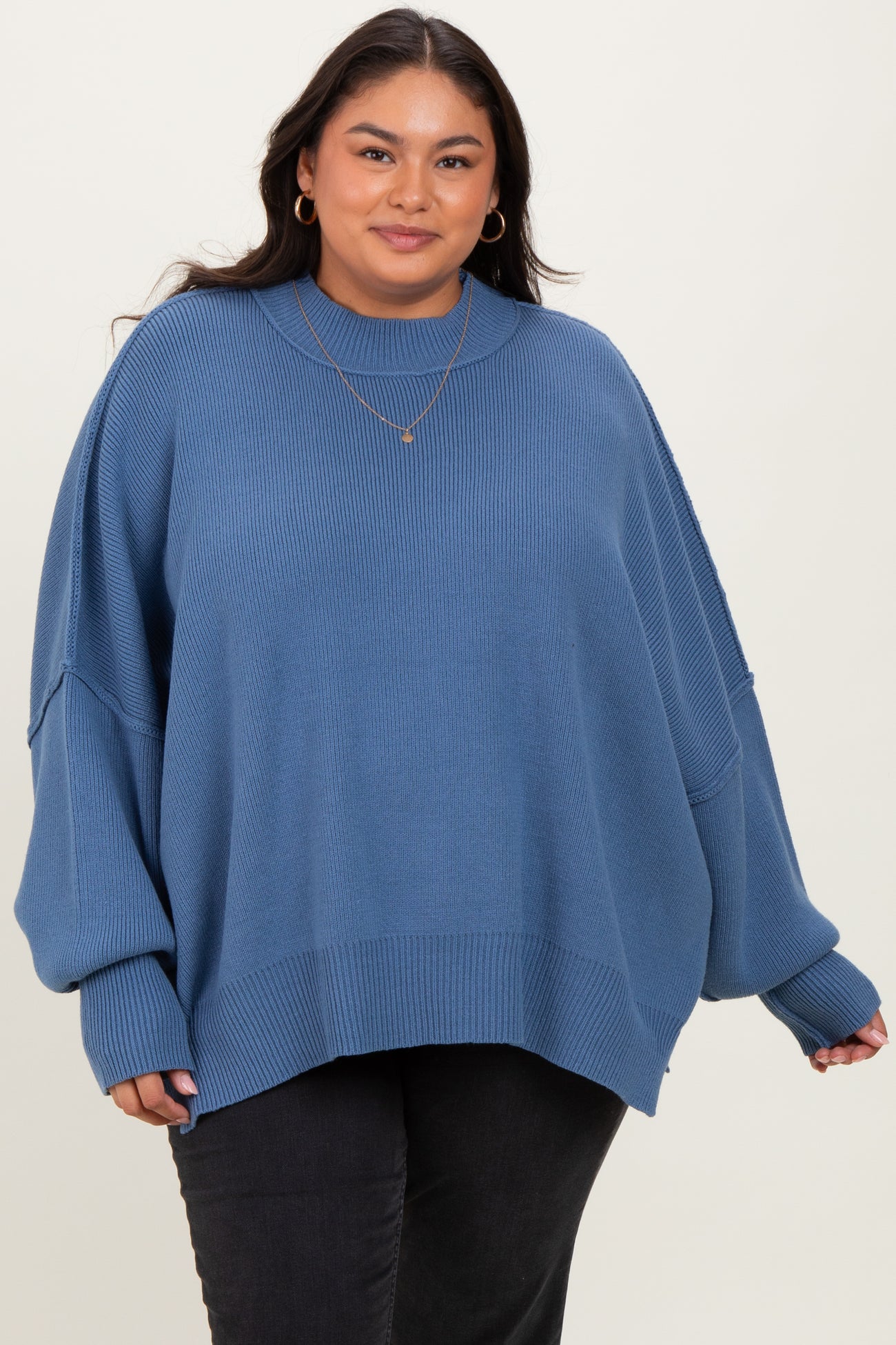 Blue Mock Neck Exposed Seam Sweater