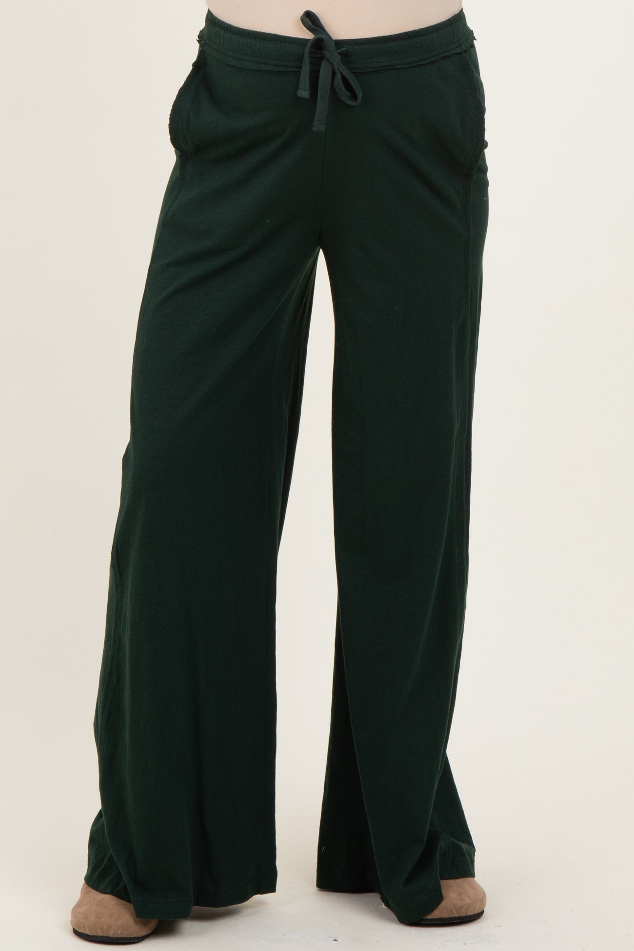 maternity wear dark green wide-leg pants with an adjustable drawstring waist and side pockets