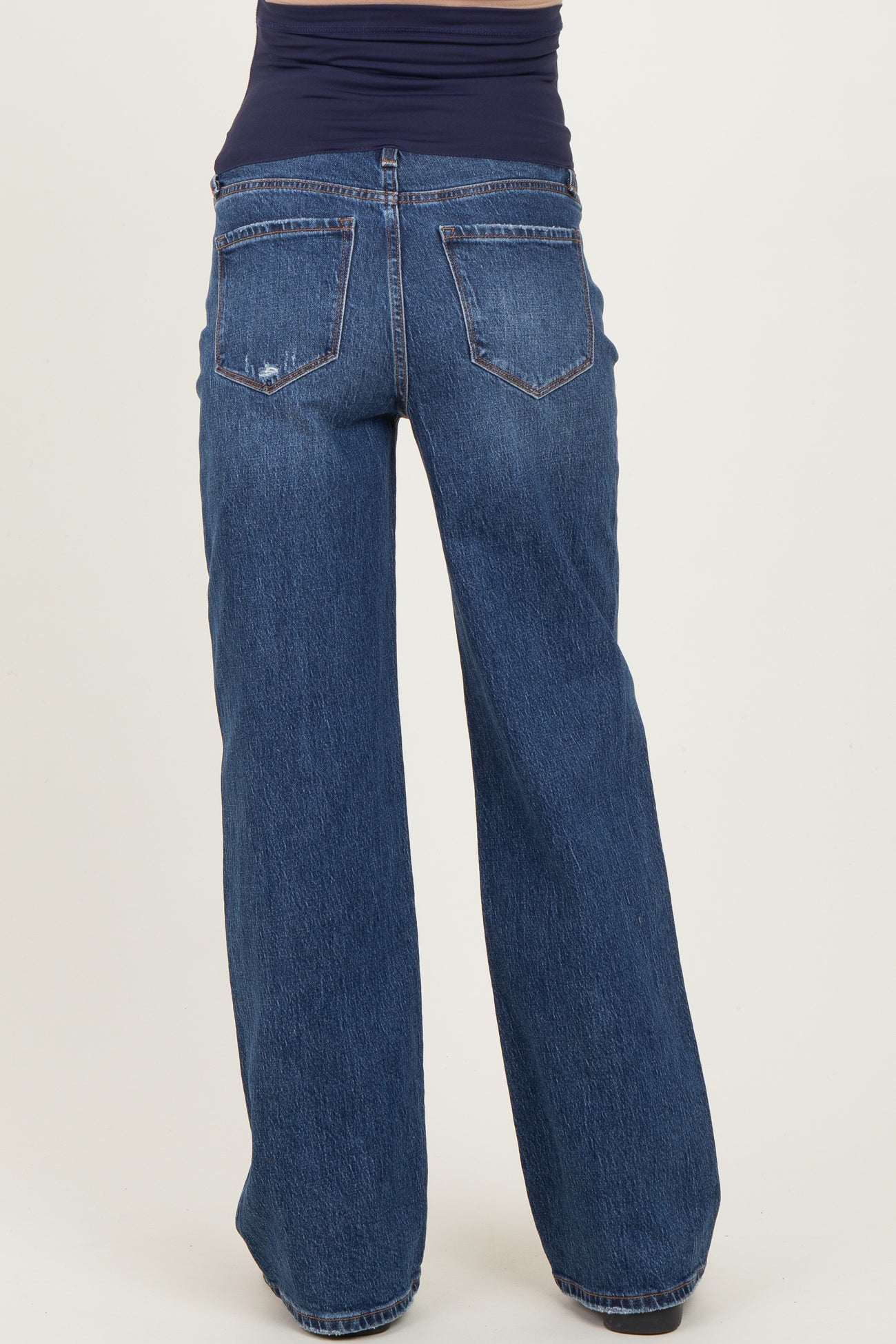 maternity wear dark blue wide leg jeans with a high waistband, shown from the back