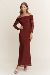 woman wearing a deep red off-the-shoulder long sleeve maxi dress with ruched detailing