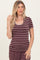 woman wearing a maroon and cream striped short sleeve top with a scoop neckline