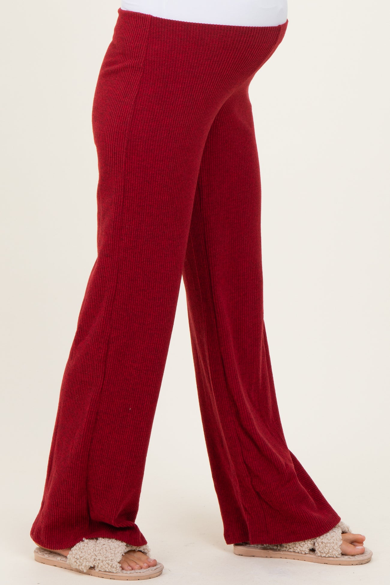 maternity wear red ribbed flare pants with a comfy fit and an elastic waistband, perfect for expecting mothers