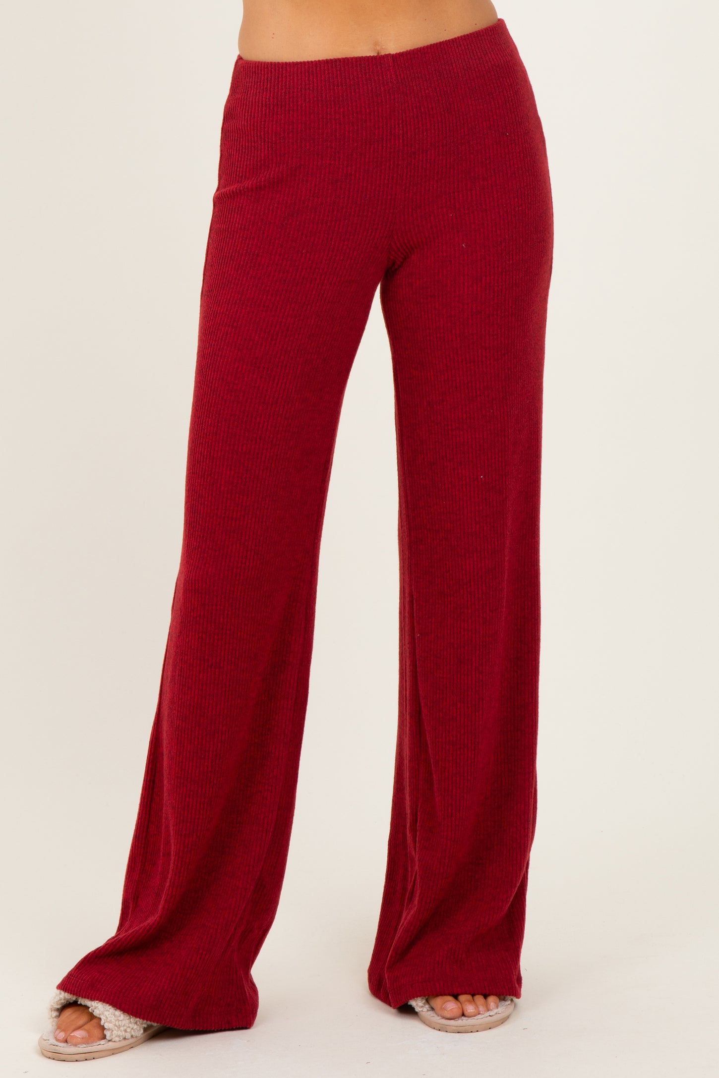 woman wearing burgundy ribbed wide-leg pants