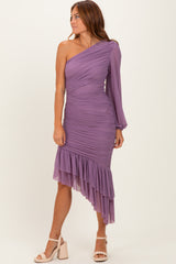 woman wearing a lavender one-shoulder ruched dress with a ruffled hem and long sleeve detail