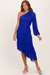 woman wearing a royal blue one-shoulder ruched dress with a flounced hemline and long puff sleeve