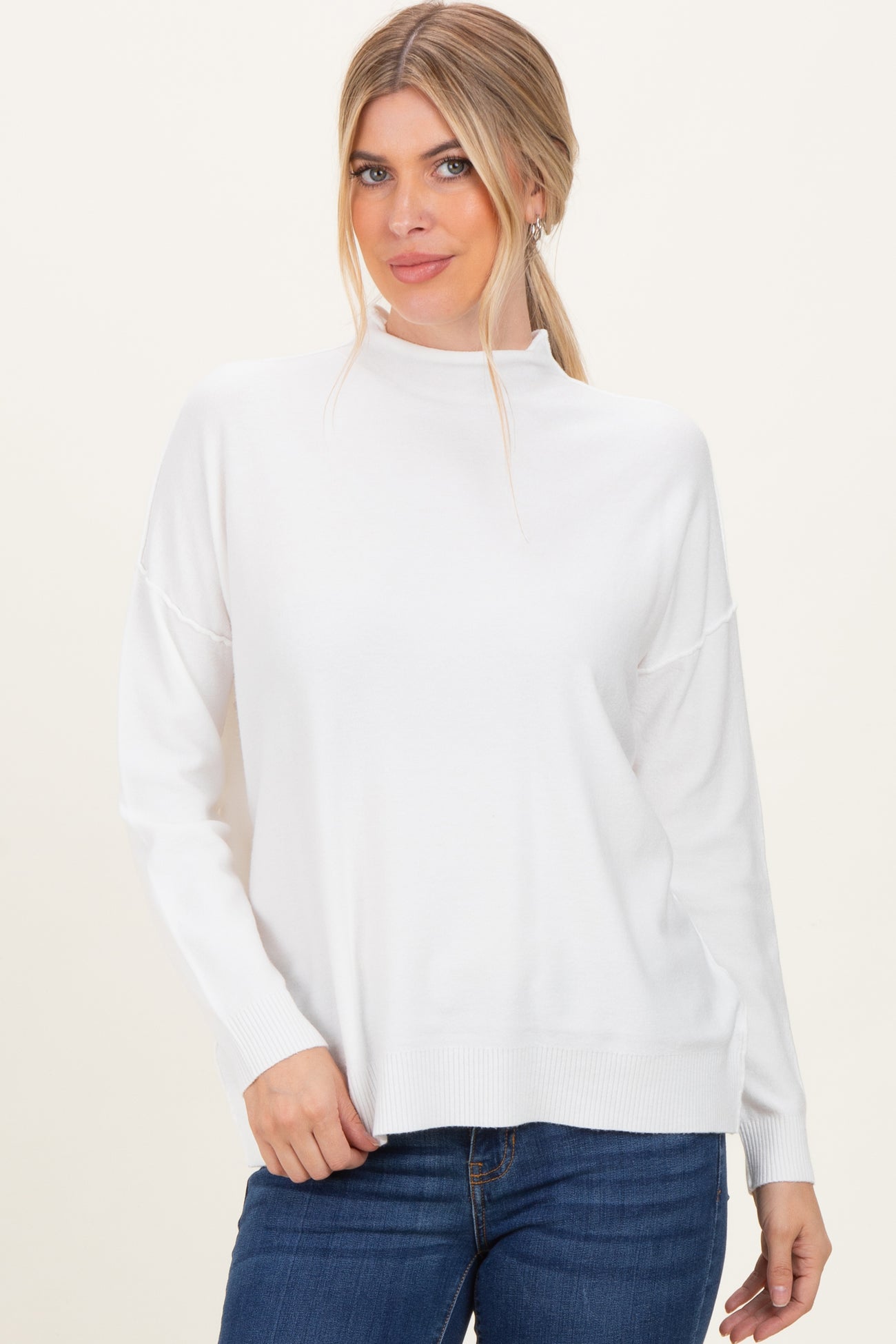 Ivory Mock Neck Exposed Seam Sweater