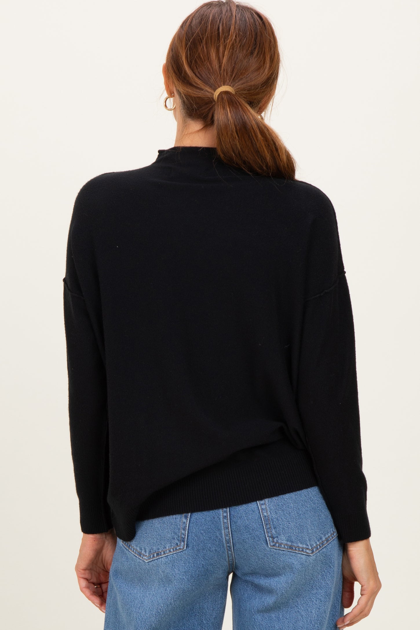 Black Mock Neck Exposed Seam Sweater