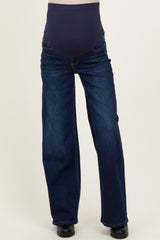 maternity wear dark blue straight leg jeans with a navy supportive belly band, model standing straight on a neutral background