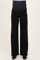 maternity wear black wide-leg pants with a supportive over-the-bump belly panel, styled with a fitted top