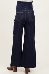 woman wearing dark blue maternity wide leg jeans with a stretchy waistband, viewed from the back