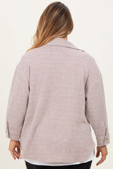plus size woman wearing a light pink striped maternity sweater with a relaxed fit and buttoned cuffs, viewed from the back