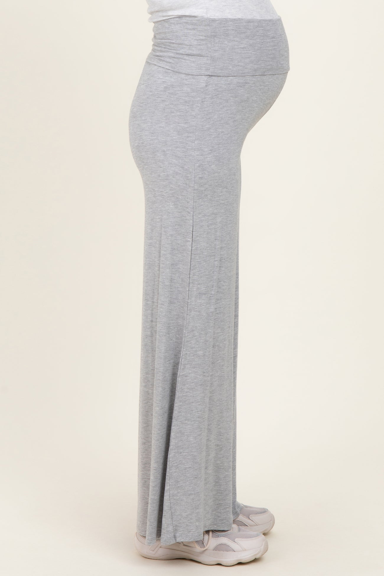 maternity wear grey maxi skirt with a foldover waistband and a visible baby bump