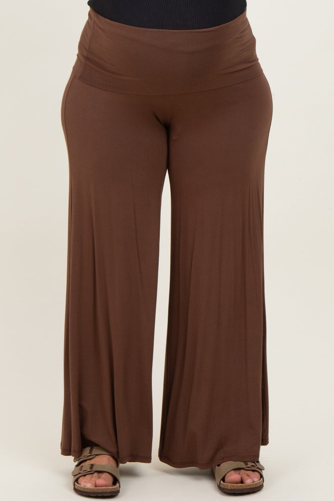 woman wearing a brown maternity plus wide-leg pants with a comfortable high waistband