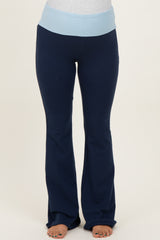 maternity wear navy blue flared pants with a light blue waistband, model not visible