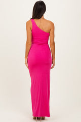 woman wearing a form-fitting hot pink one-shoulder maxi dress showing a sleek silhouette from the back