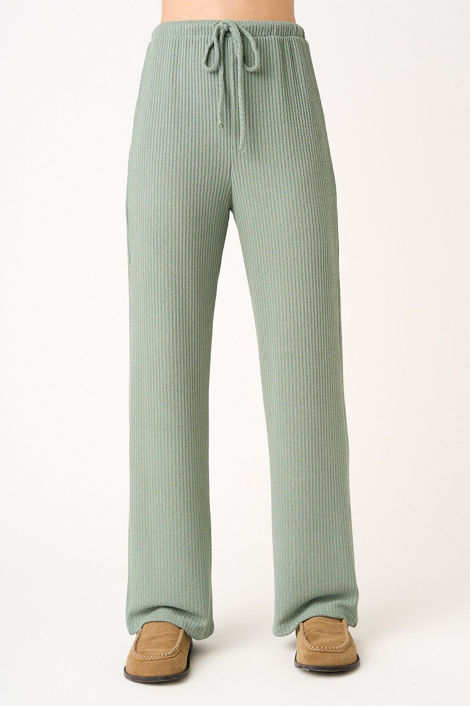 woman wearing light green ribbed wide-leg pants with an adjustable drawstring waistband