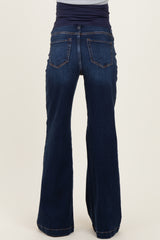 maternity wear dark blue flared jeans with a stretchy waistband, model shown from the back