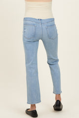 light blue maternity jeans with a high waist and slim fit, modeled from the back