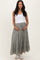 woman wearing a white tank top and a long gray tiered maternity skirt, holding her baby bump