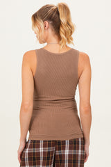 woman wearing a brown ribbed maternity tank top, shown from the back