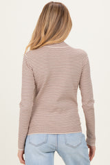 woman wearing a striped maternity top in beige and brown with long sleeves, seen from the back
