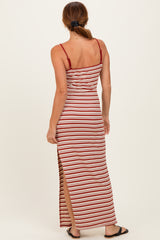 woman wearing a striped maxi dress with back slit and spaghetti straps, showing a relaxed fit from behind