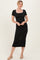 woman wearing a black short sleeve midi dress with a square neckline and fitted silhouette