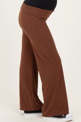 maternity wear brown wide-leg pants with a stretchy waistband and a visible baby bump