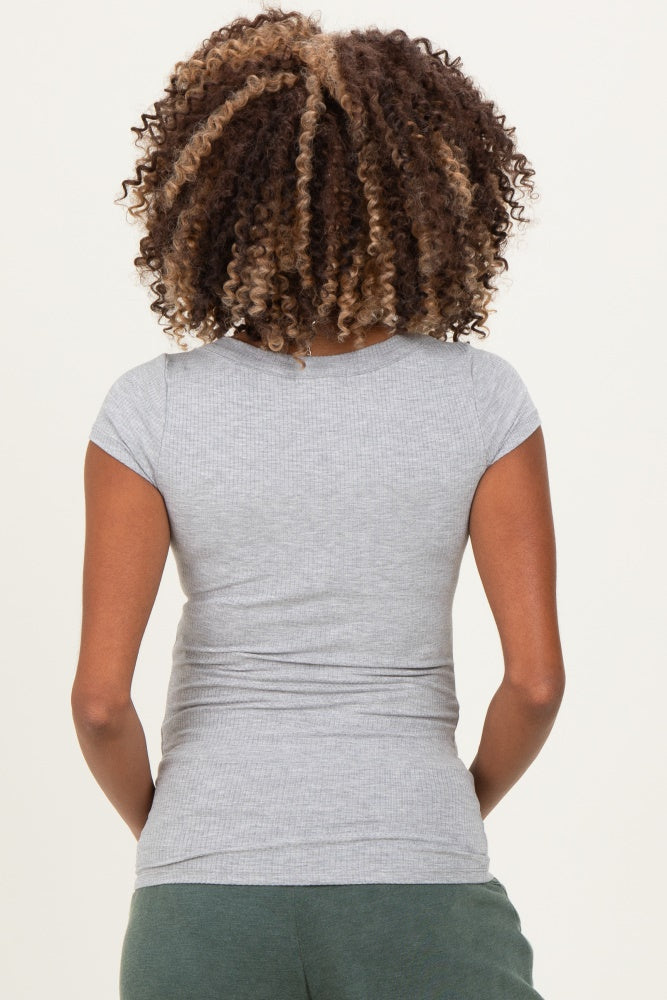 woman wearing a fitted grey maternity top with short sleeves, viewed from the back