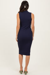 woman wearing a navy blue sleeveless ribbed midi dress with a fitted silhouette and a high neckline