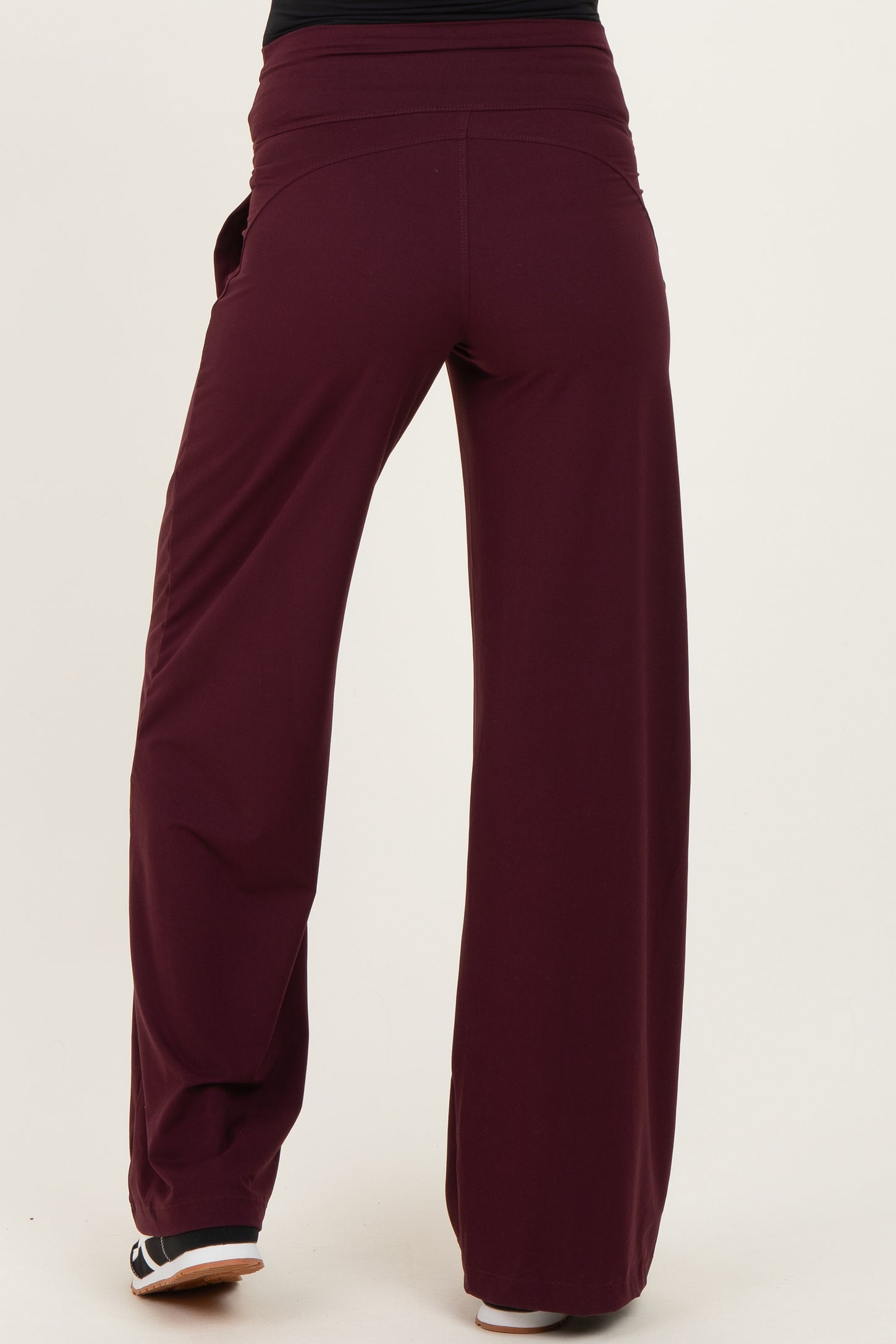 maternity wear burgundy wide-leg pants with a comfortable waistband and side pockets