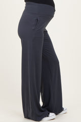 maternity wear dark gray wide-leg pants with a supportive belly panel and a relaxed fit