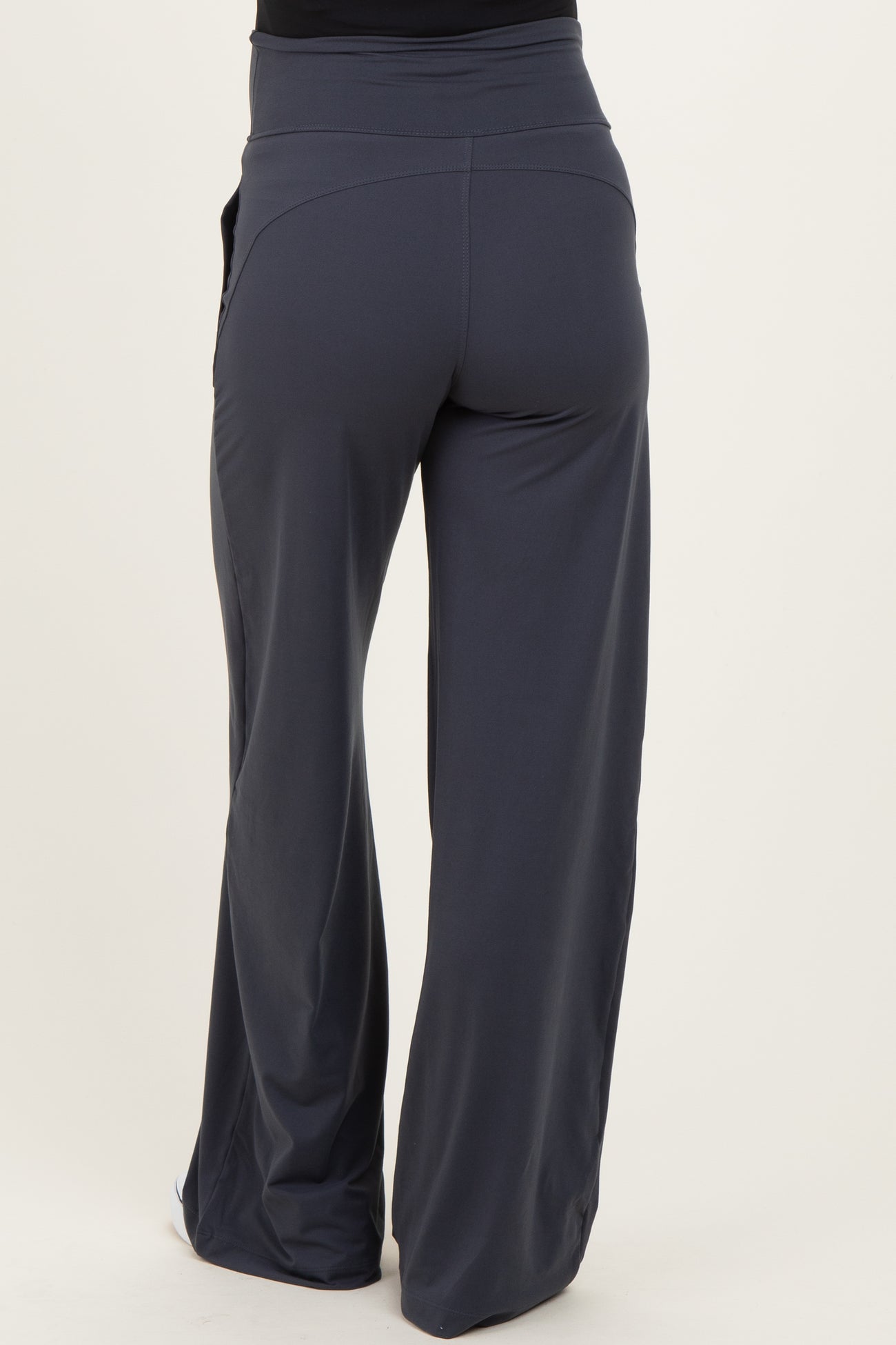 maternity wear dark gray wide-leg pants with a comfortable waistband, shown from the back