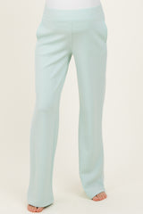 maternity wear light green wide-leg pants with side pockets, model not visible