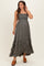 woman wearing a dark olive green strapless maternity maxi dress with ruffle details and a visible baby bump