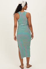 woman wearing a green and white striped maternity maxi dress with side slit and back view shown